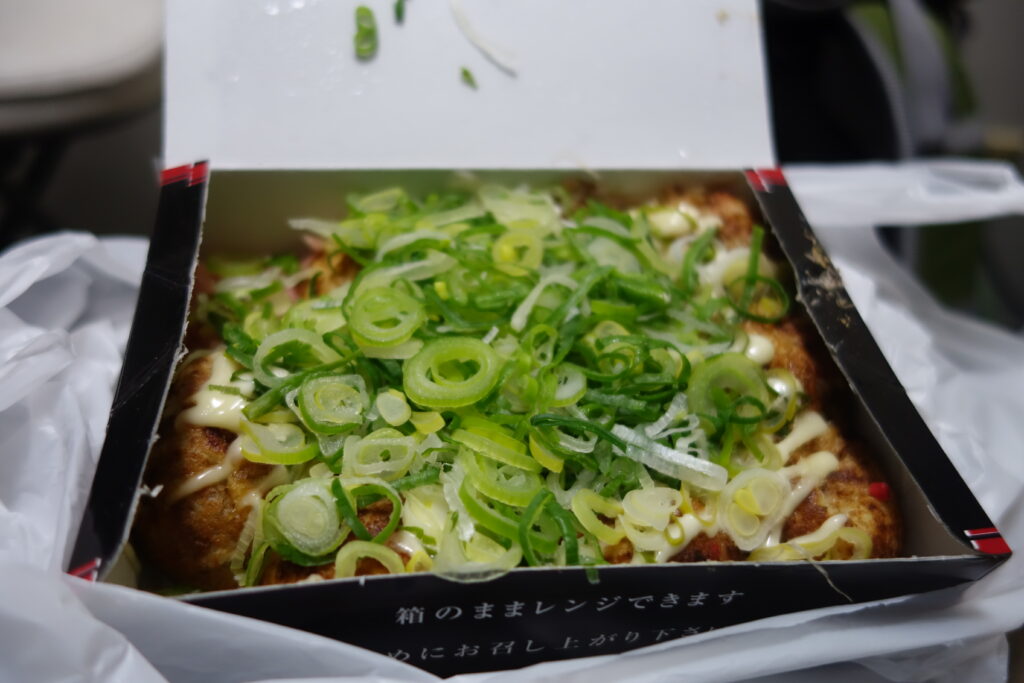 Takoyaki with diced green onions.