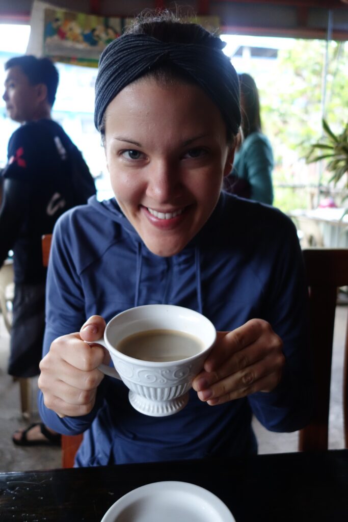 Enjoying civet coffee.