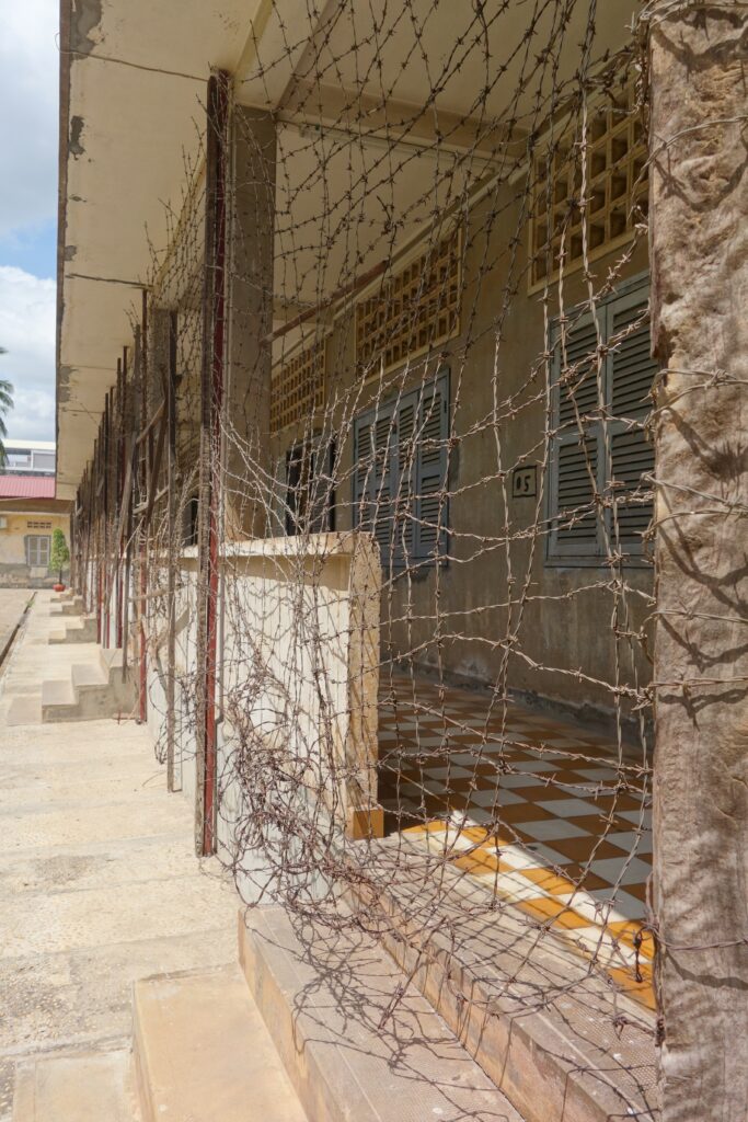 Barbed wire and razor wire keep the prisoners from escaping.