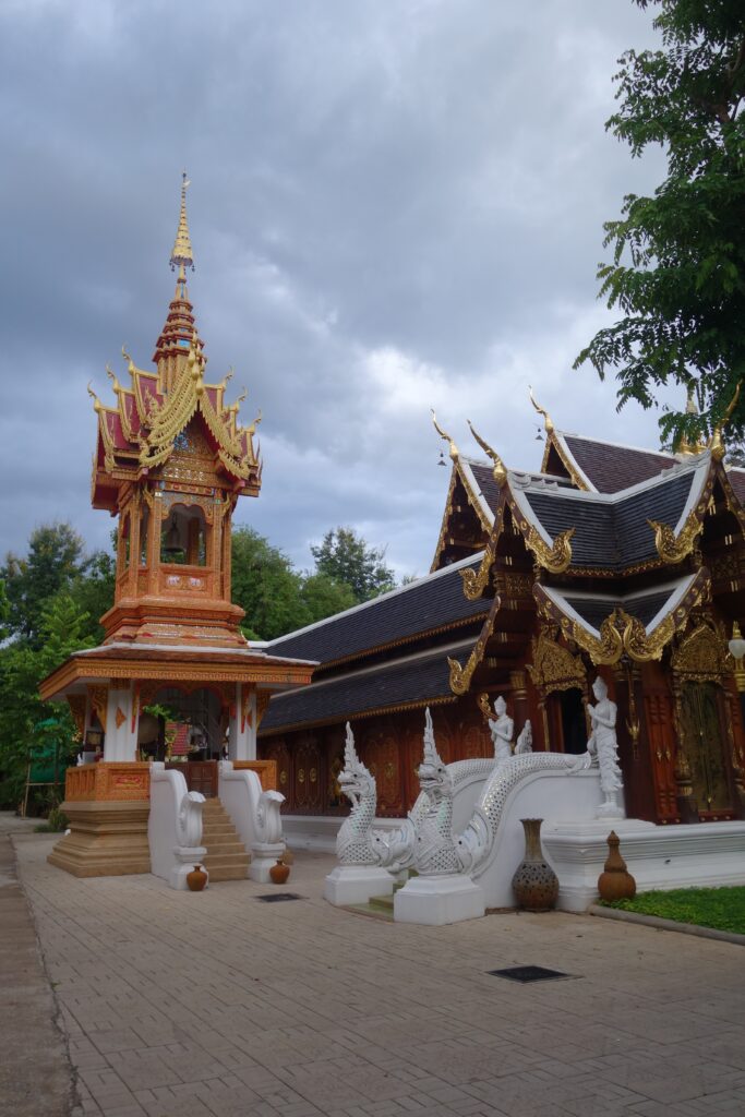 On the left is the bell that woke us up at 4 am every morning. The ordination hall is on the right; this is where monks would do their daily chants and the Thai members would hold Sangha.