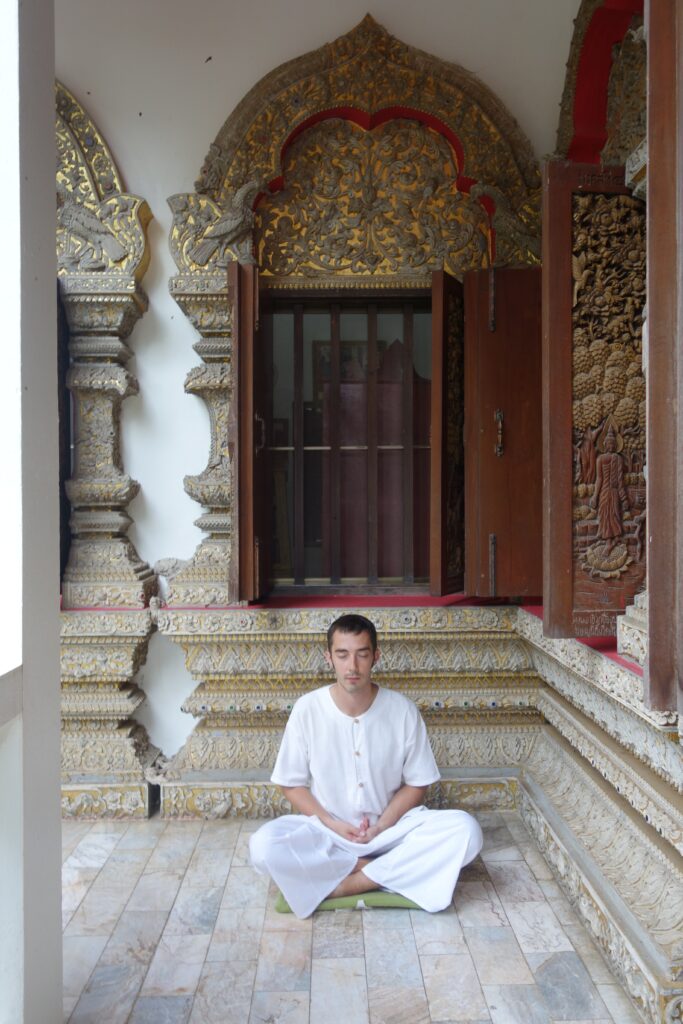 Jon demonstrating the sitting meditation pose.