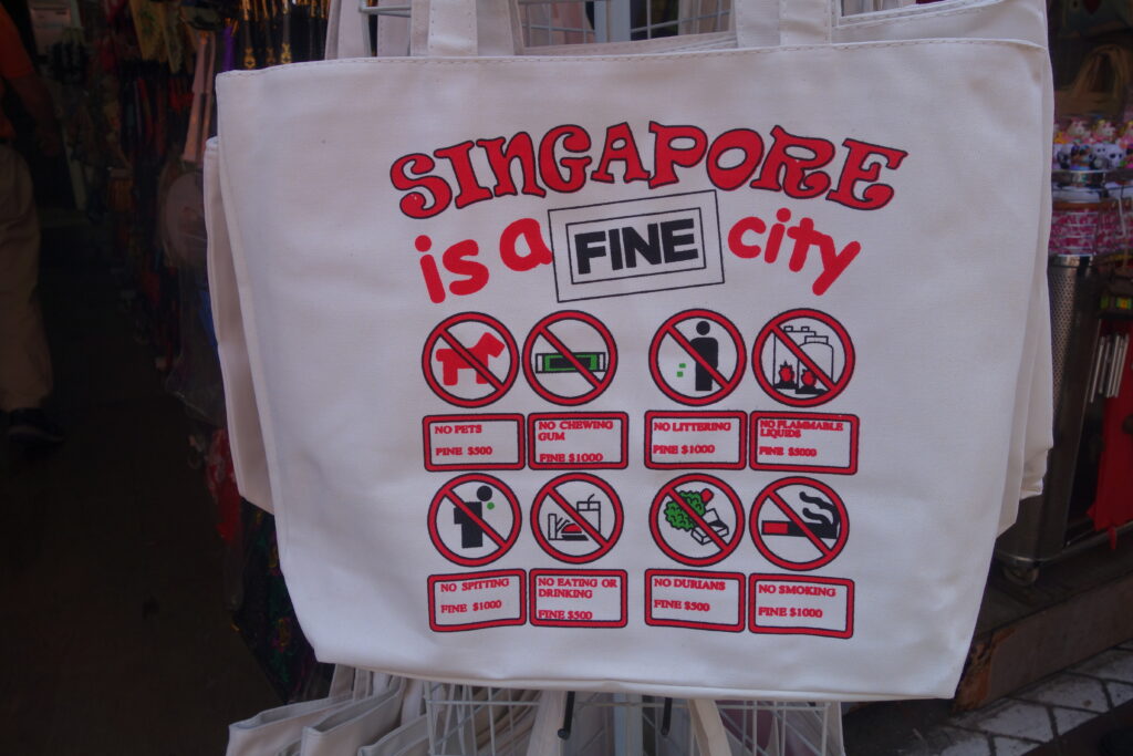 Street vendors capitalizing on Singapore's laws.