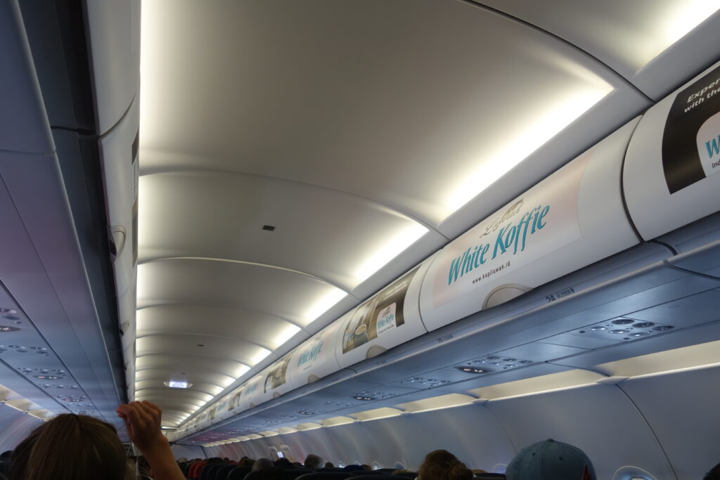 Our Malaysian airline was walpapered with advertisements for white coffee.
