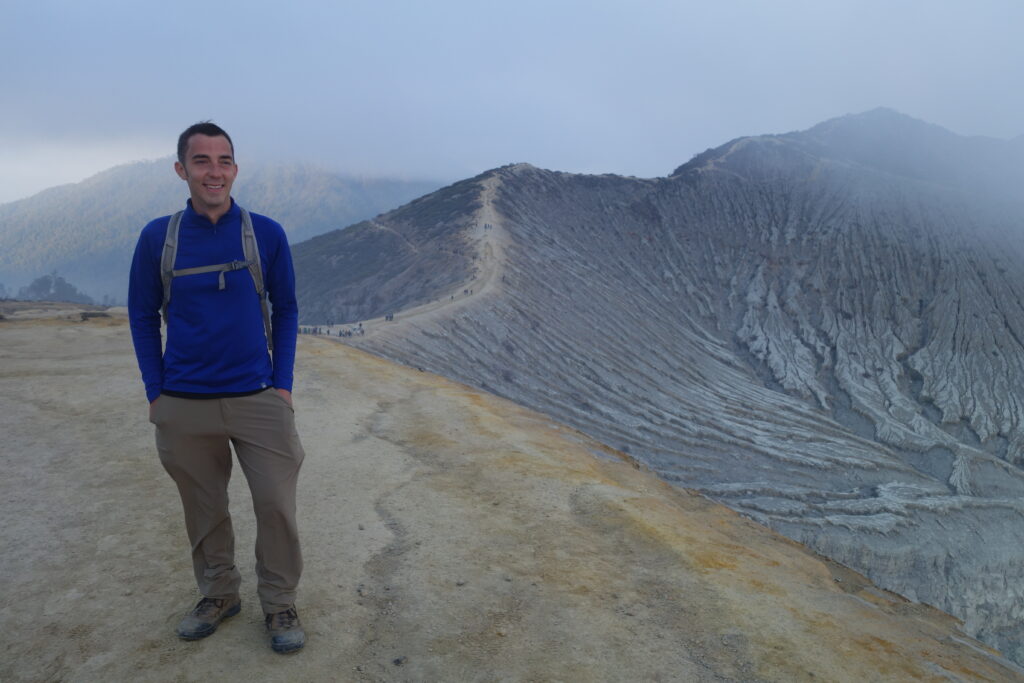 Jon posing with the crater rim trail in the background. 
