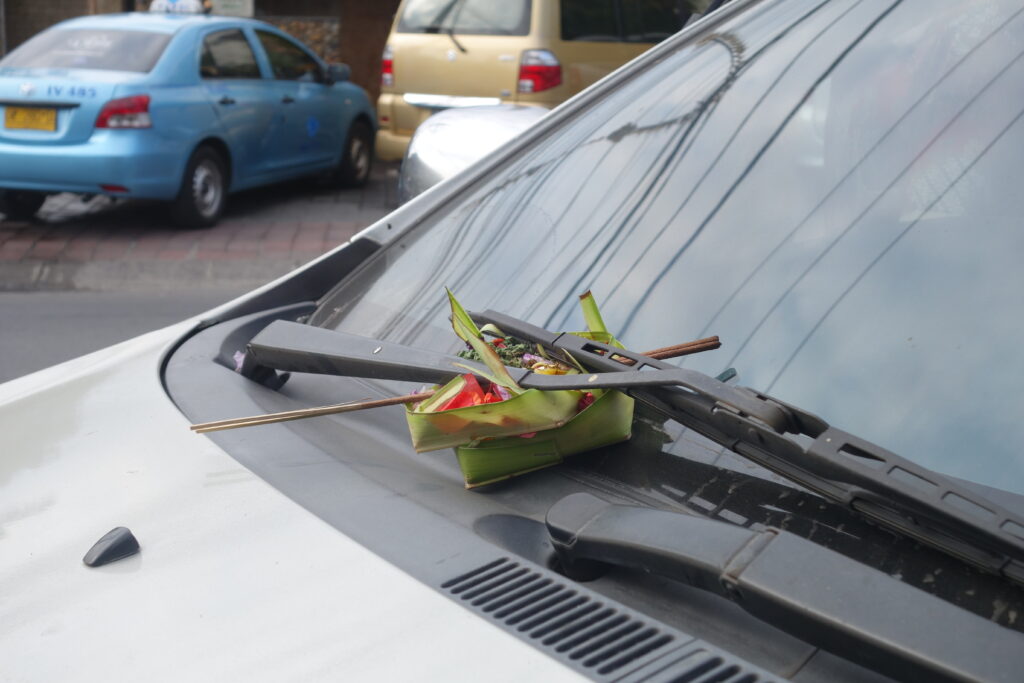 Our taxi driver stopped to have our car blessed mid drive.