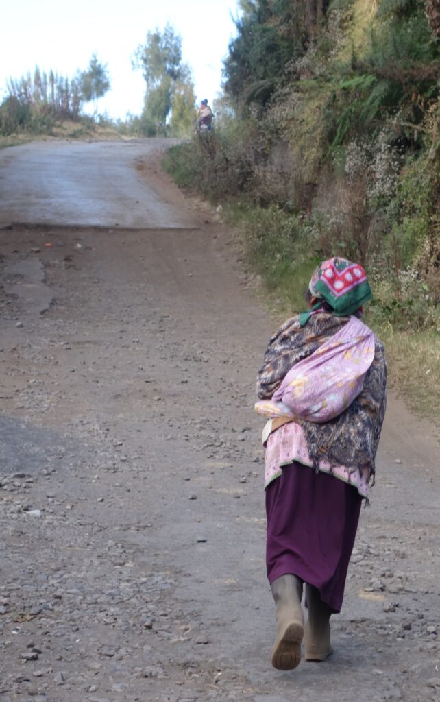 A tied cloth sack carried by a local in Cemoro Lawang. 